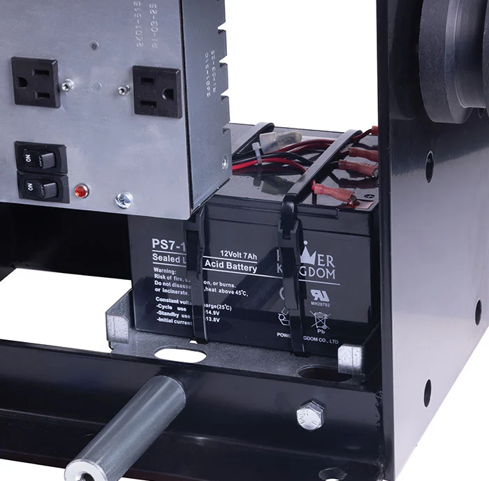 DoorKing DKS 2170 slide gate operator showing internal backup battery compartment