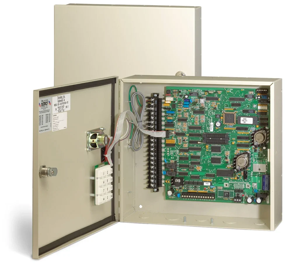 Inside view of DKS 1838 Multi-Door Controller showing internal circuit board and wiring.