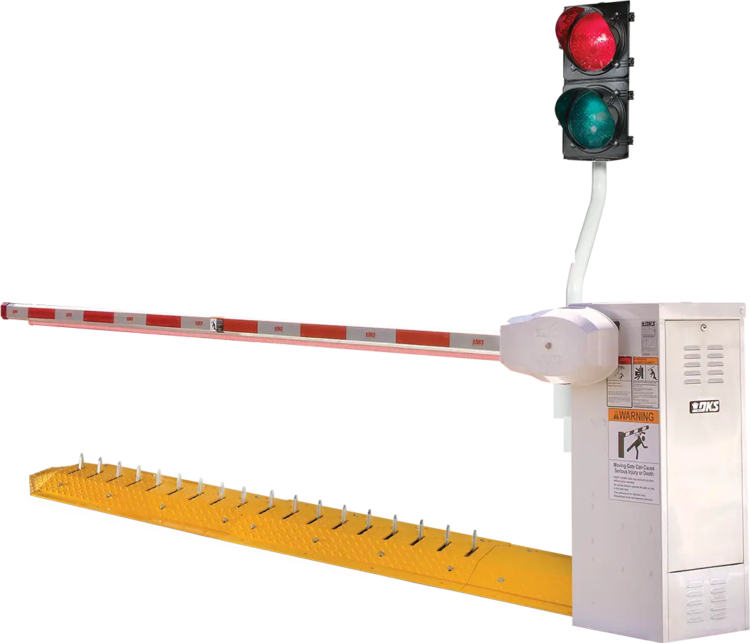 DoorKing 1603 AutoSpikes automated traffic control system showing the barrier gate operator mechanically linked to retractable surface-mount tire spikes, with the barrier arm raised and spikes in the raised (active) position.