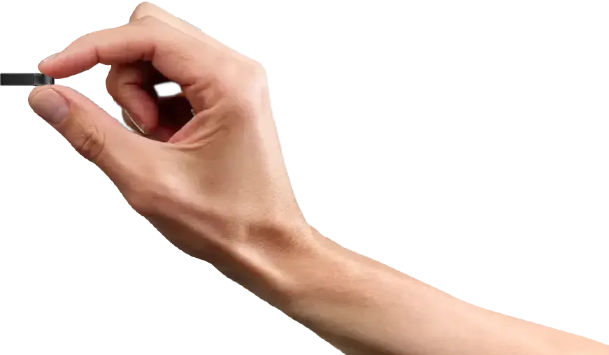 Person's fingers pinching the USB slider to eject storage device from the smart eVolve controller board by DoorKing, highlighting automatic settings backup.